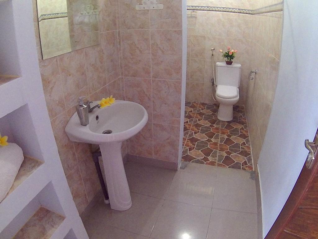 24/7 Bed&Breakfast Jimbaran Zimmer foto